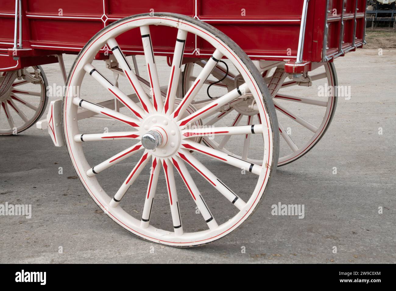 red and white horse wagon wheel state fair Stock Photo