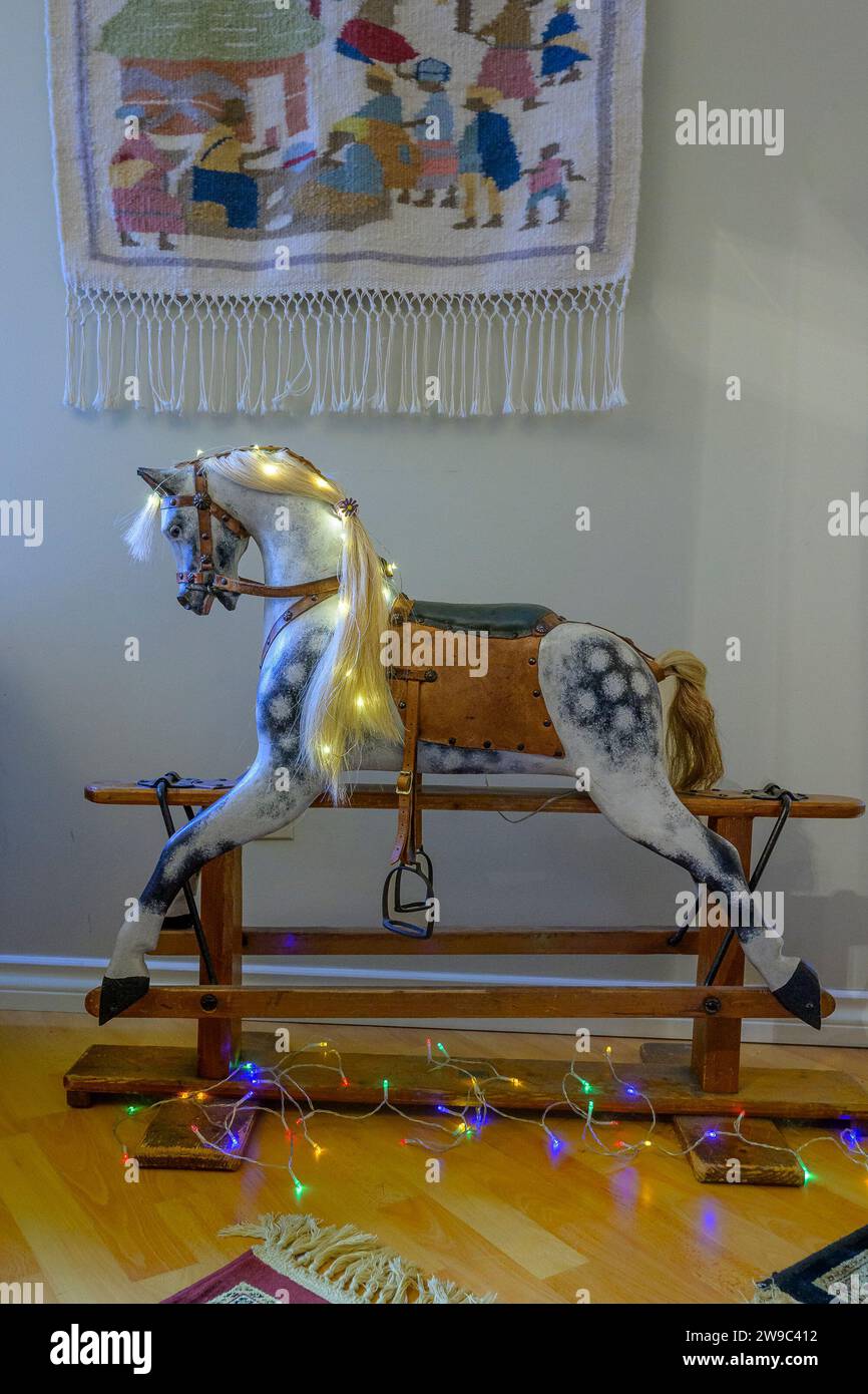 Traditional wooden Rocking Horse, BCL Rambler, with horsehair main, tail, saddle and reins, Stock Photo