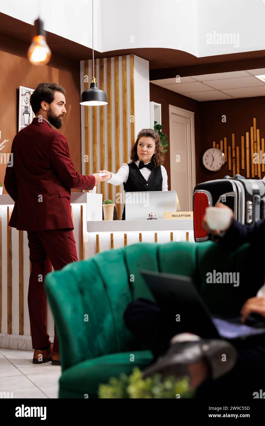 Resort staff welcoming guest hi-res stock photography and images - Alamy