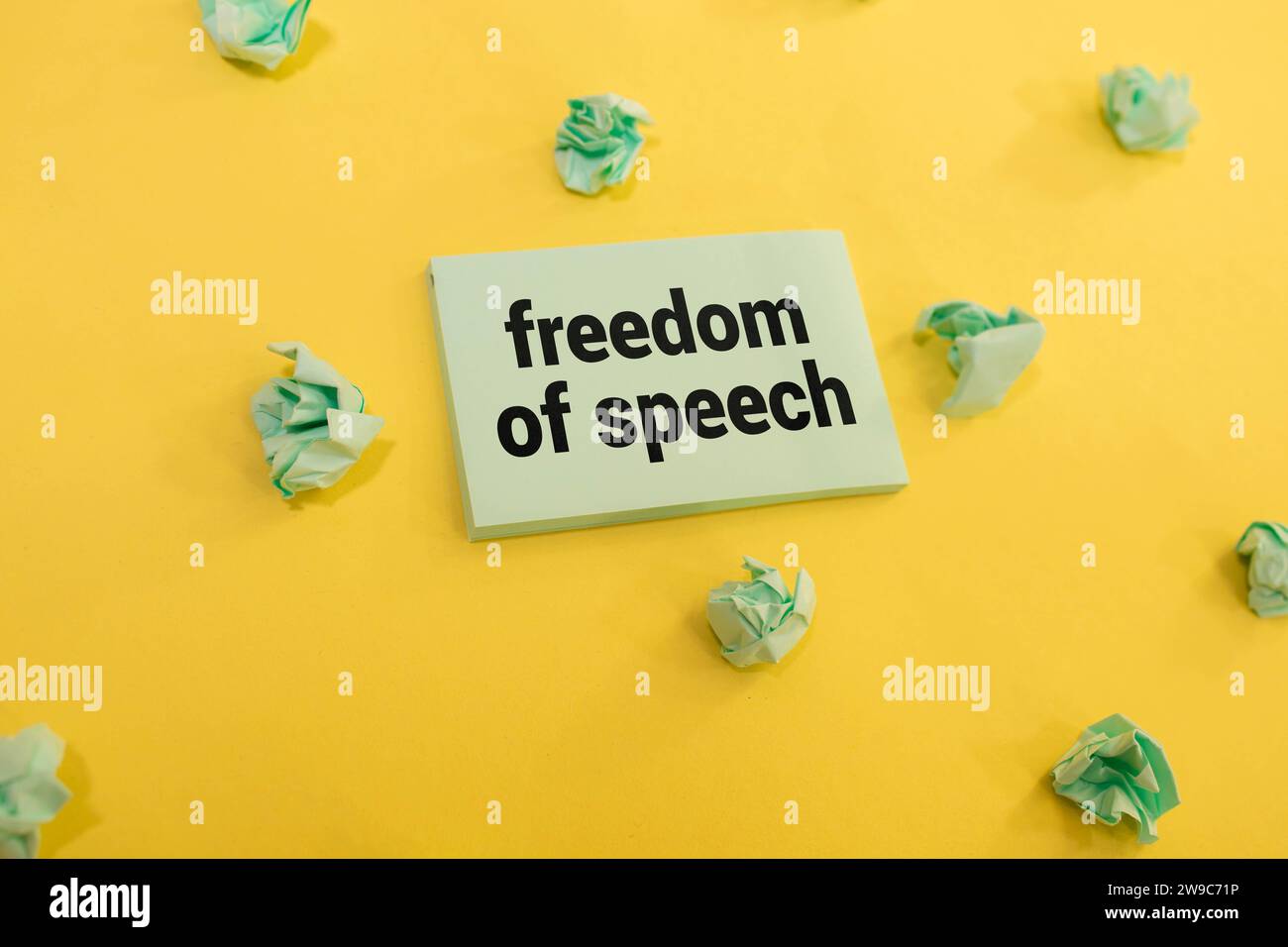 Rolled newspaper with the headline freedom of speech stock photo alamy