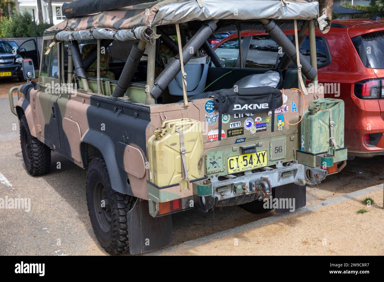 1989 model Land Rover Defender parked in Sydney Australia water fuel containers carried on rear bumper, Australia Stock Photo