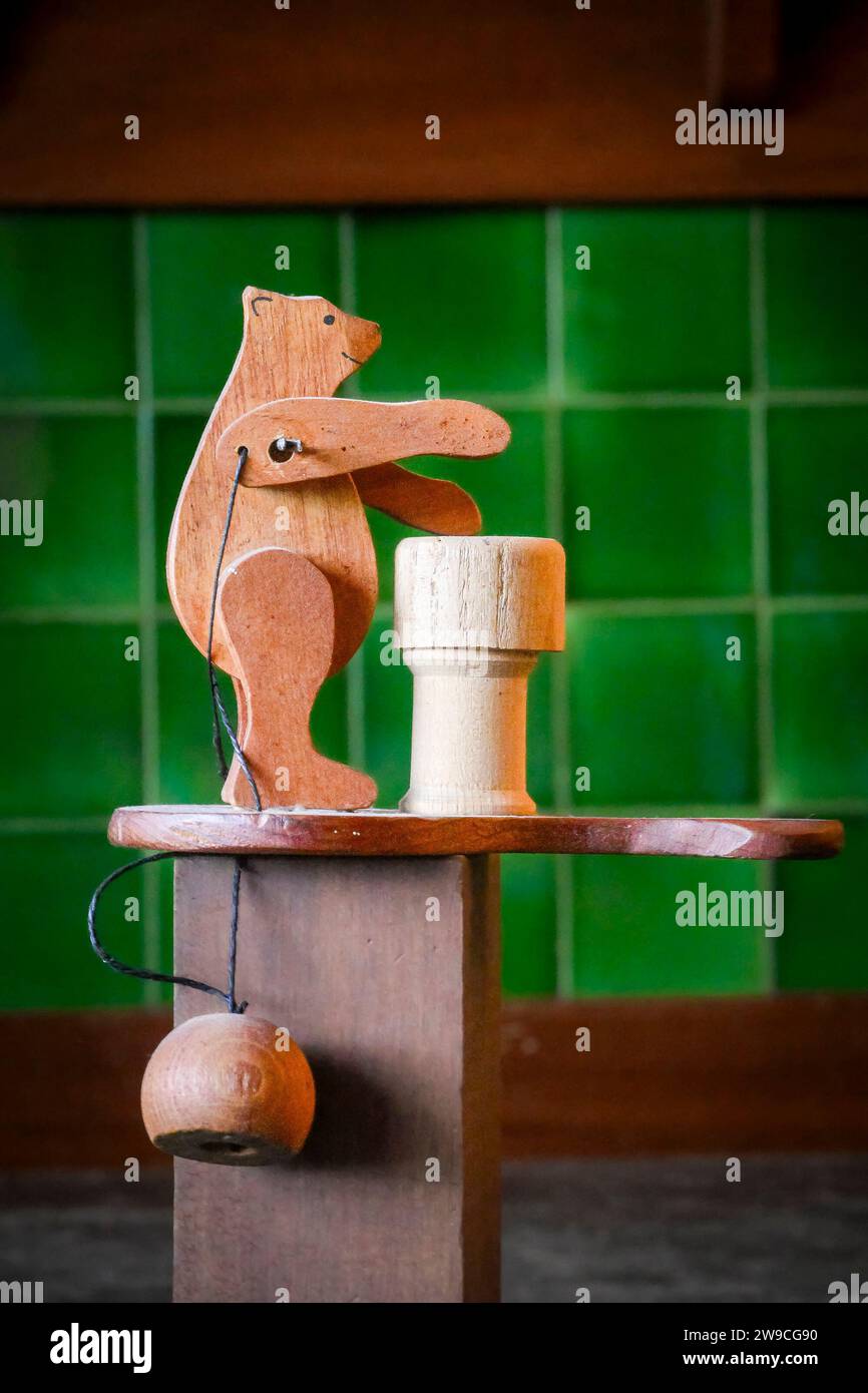Traditional wood drumming bear toy Stock Photo - Alamy