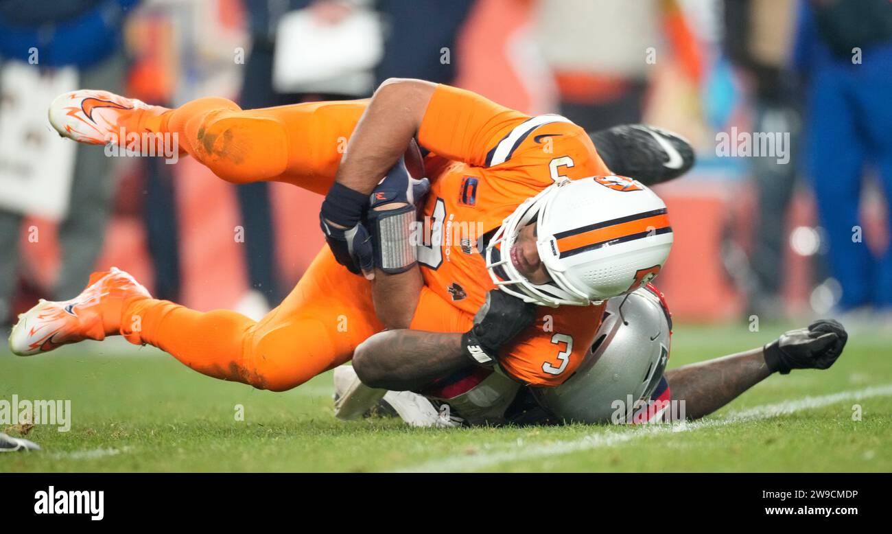 Denver Broncos quarterback Russell Wilson (3) is sacked by New England ...