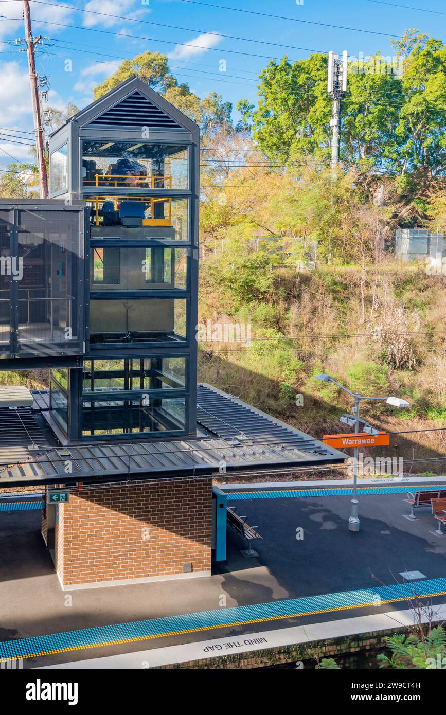 An accessible wheelchair friendly train platform lift at Warrawee Railway Station on the T1 line on Sydney's North Shore in New South Wales, Australia Stock Photo