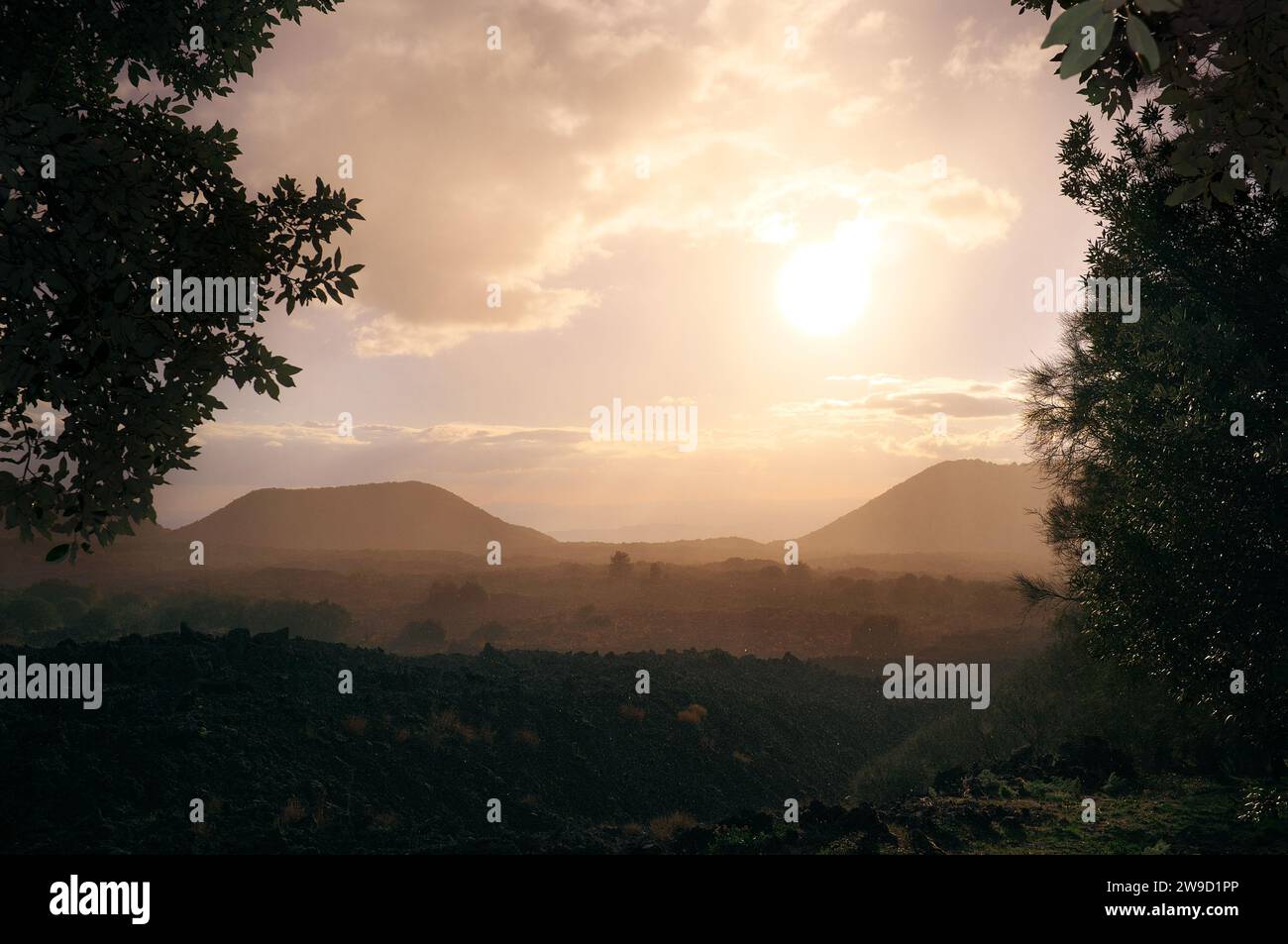 raining in sunlight on landscape of old and wide lava field and inactive old volcanoes in Etna Park, Sicily, Italy (2) Stock Photo