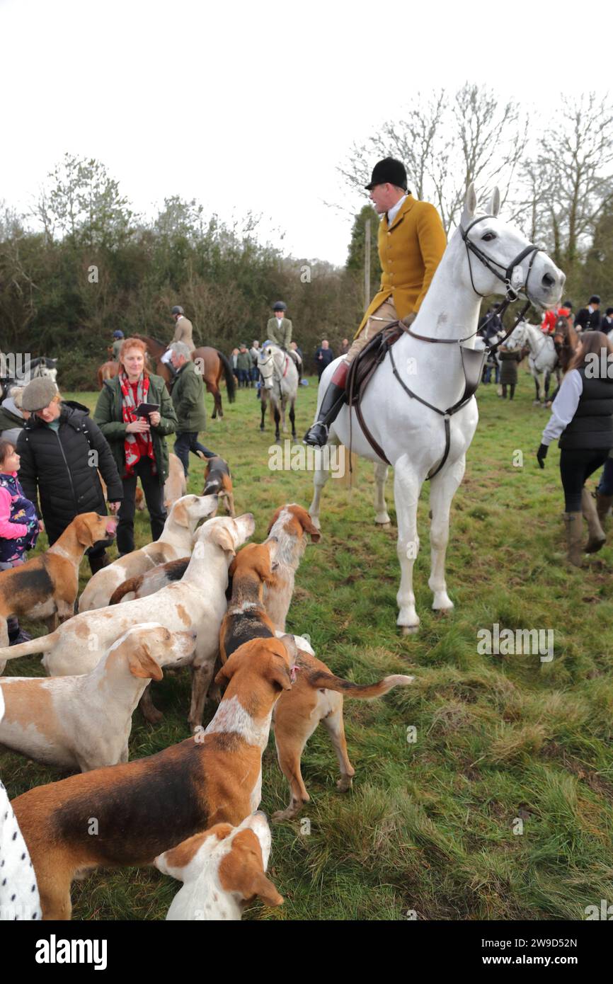 Hawridge, Chesham, UK. 26th Dec, 2023. Riders and their hounds gather in a field before the annual hunt. Credit: Uwe Deffner/Alamy Live News Stock Photo