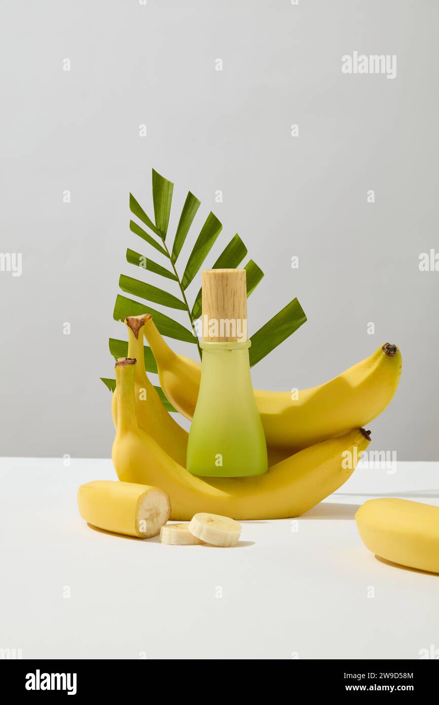 Mockup scene for advertising cosmetic of banana extract green glass