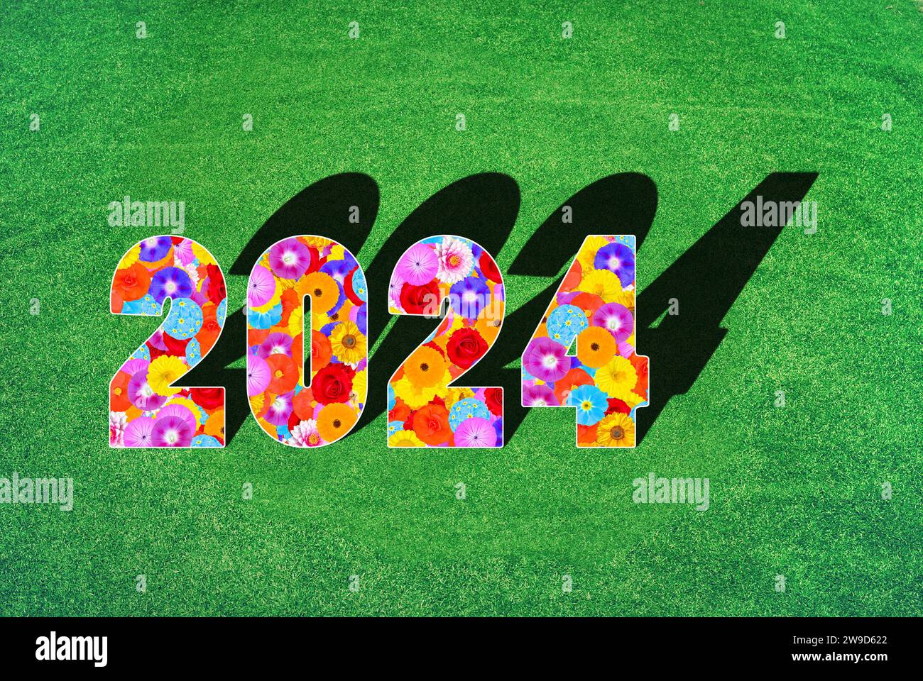 Year, number 2024, written with floral pattern of many different flowers and colors Stock Photo