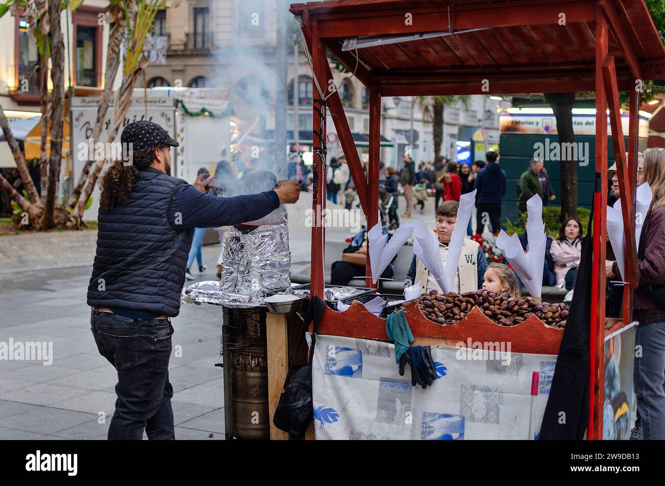 Seville, Spain; December 6, 2023: Stand of chestnuts in the street. Stock Photo