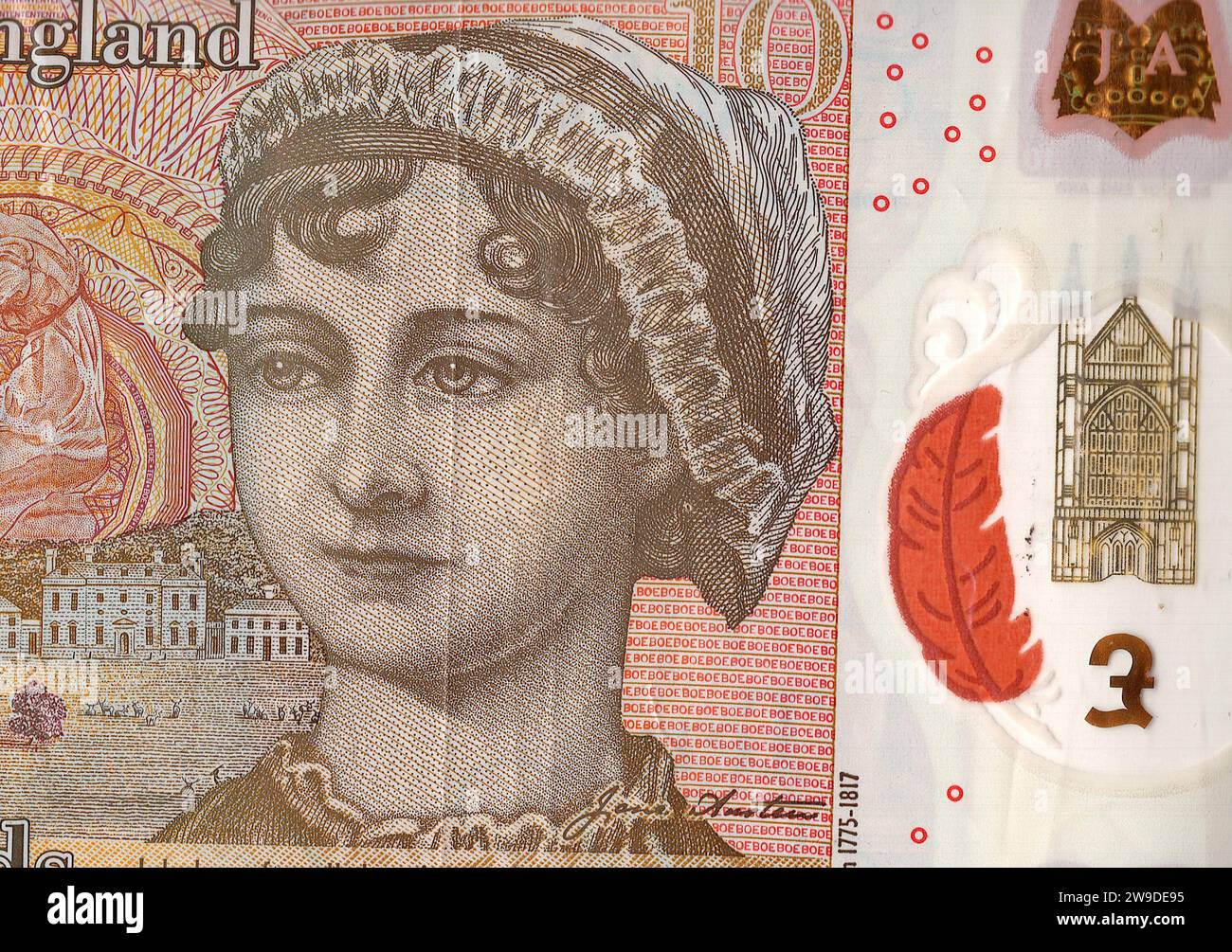 Close up of a ten pound note featuring a portrait of Jane Austen from the United Kingdom/Great Britain on a white background. Stock Photo