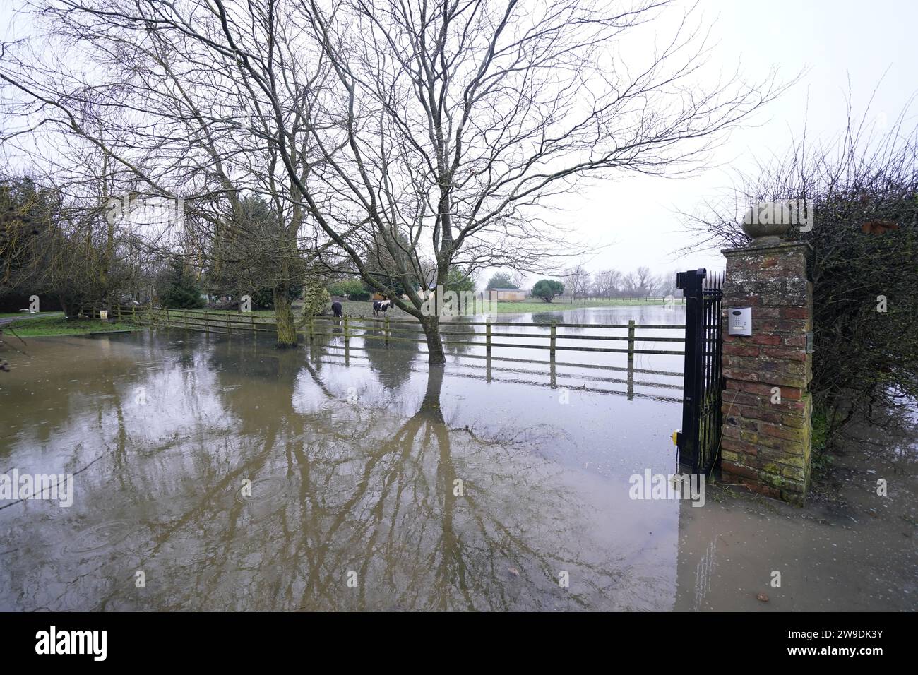 A flooded driveway near Watton in Yorkshire. Storm Gerrit will bring strong winds and heavy rain to many parts of the UK on Wednesday, with wintry hazards also likely, forecasters warned. Picture date: Wednesday December 27, 2023. Stock Photo