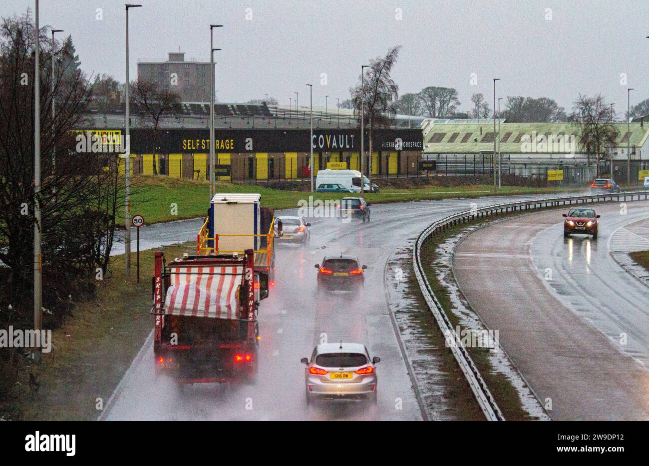 Dundee, Tayside, Scotland, UK. 27th Dec, 2023. UK Weather: Storm Gerrit unleashed torrential rain and 60 mph winds on Tayside overnight, causing floods and hazardous driving conditions for motorists on the Dundee Kingsway West Dual Carriageway. Credit: Dundee Photographics/Alamy Live News Stock Photo