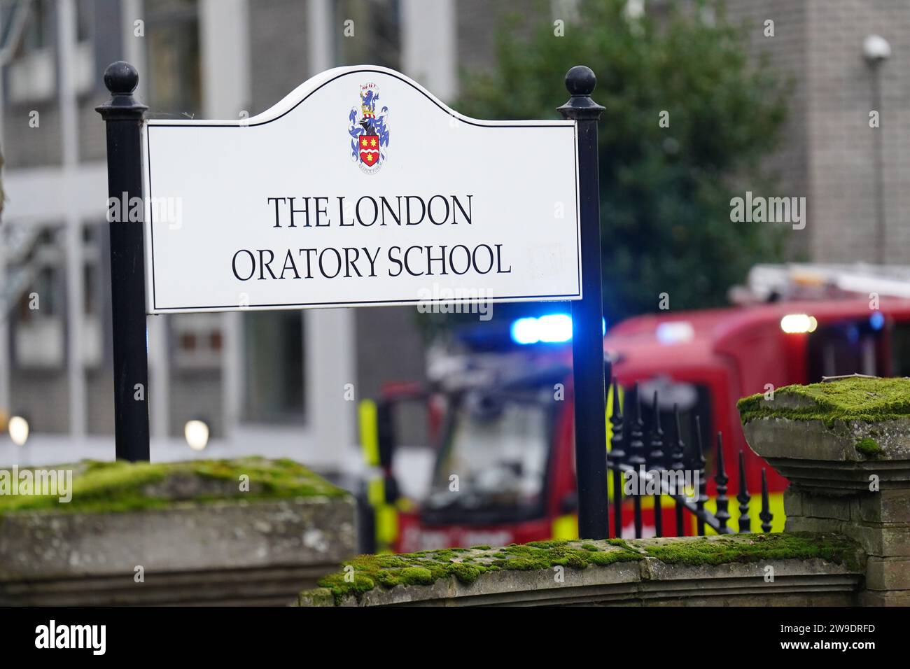 Signage for London Oratory School on Seagrave Road in Fulham, west London as fighfighters tackle a blaze at the school. An atrium is alight in the four storey building, the fire brigade said. Picture date: Wednesday December 27, 2023. Stock Photo