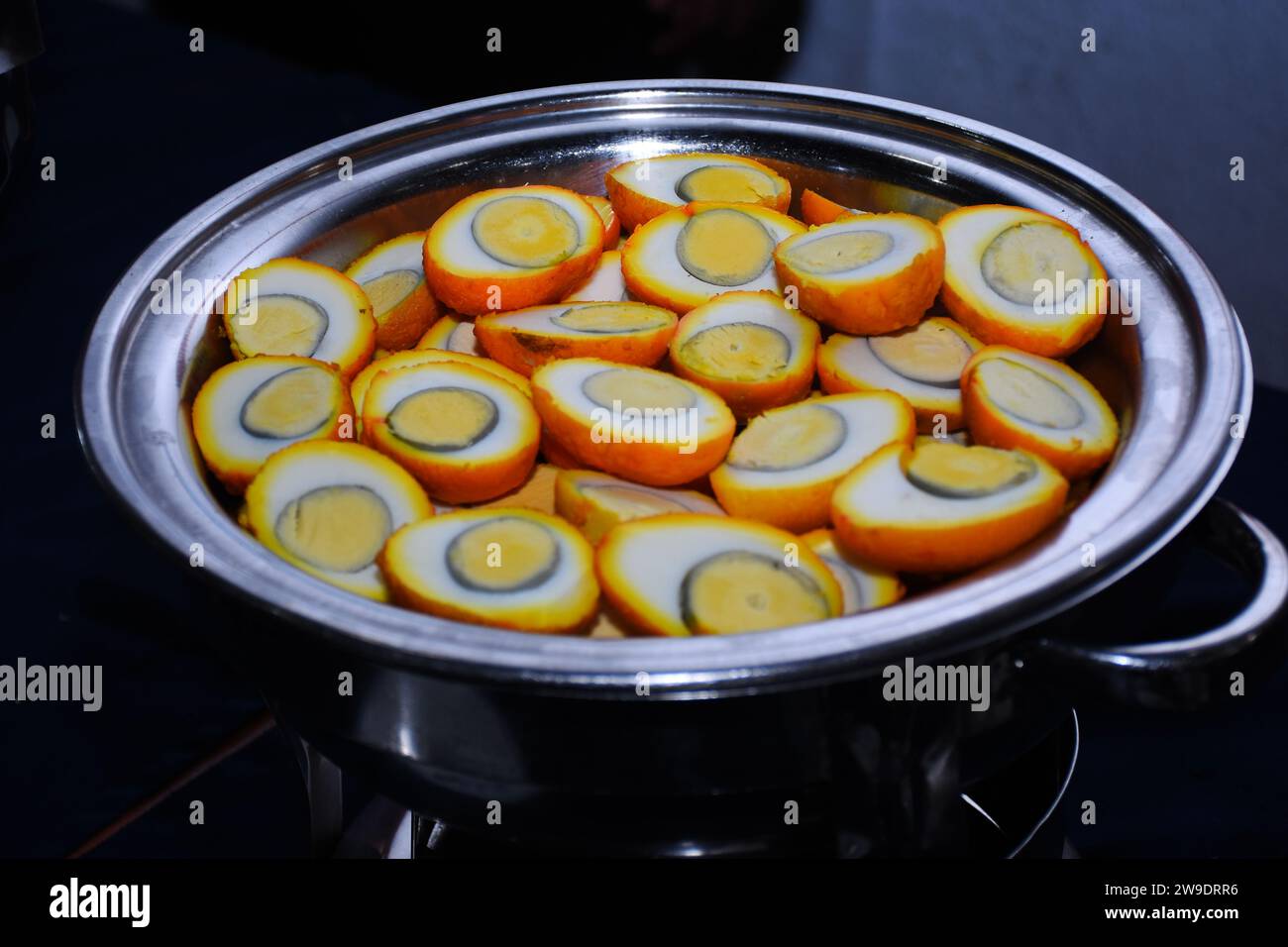 Hard-boiled chicken eggs cut into halves for food in Buffet Stock Photo
