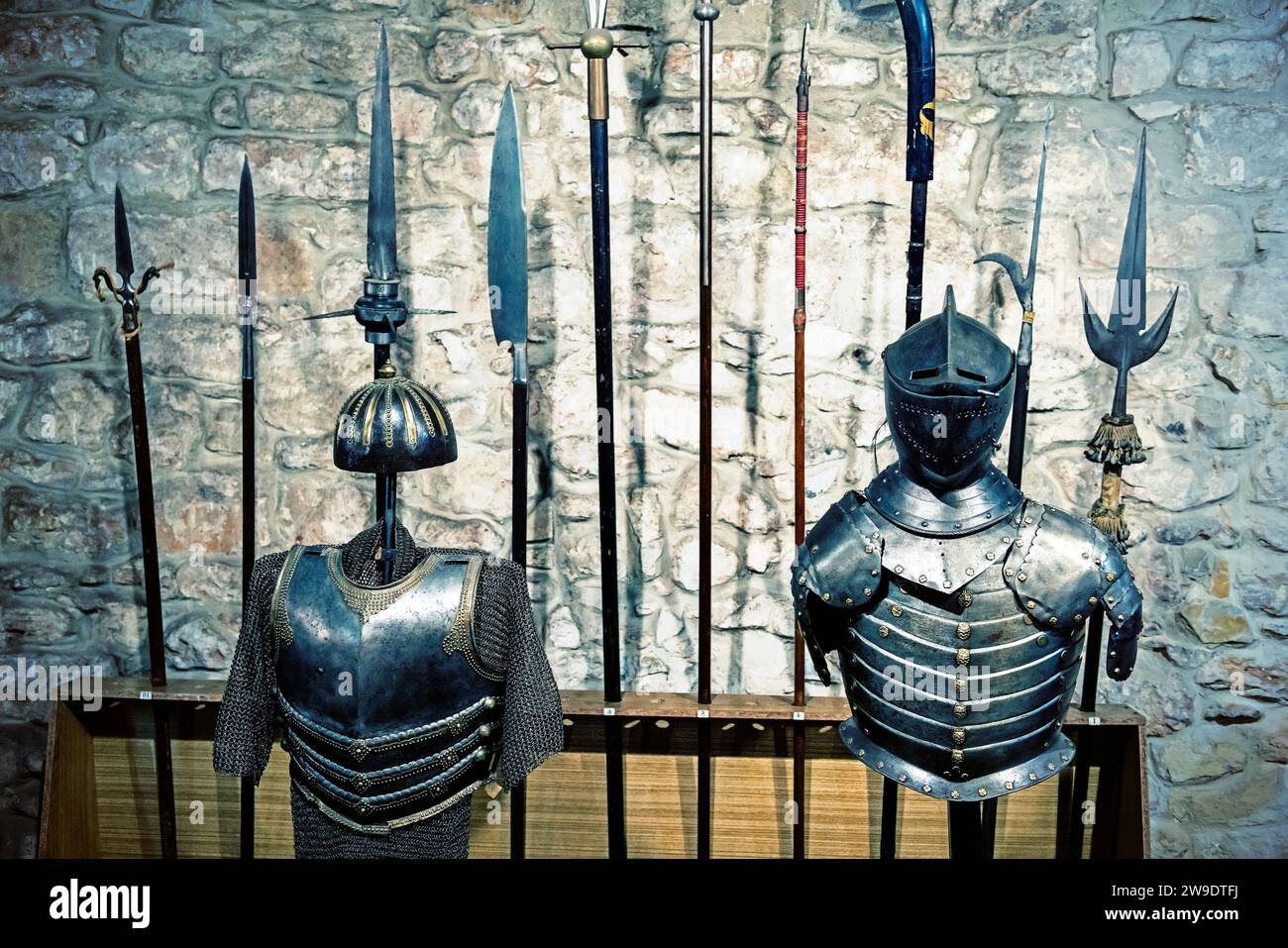 Gallery of knight's armor. Knight's iron armor in the museum. toned. Stock Photo