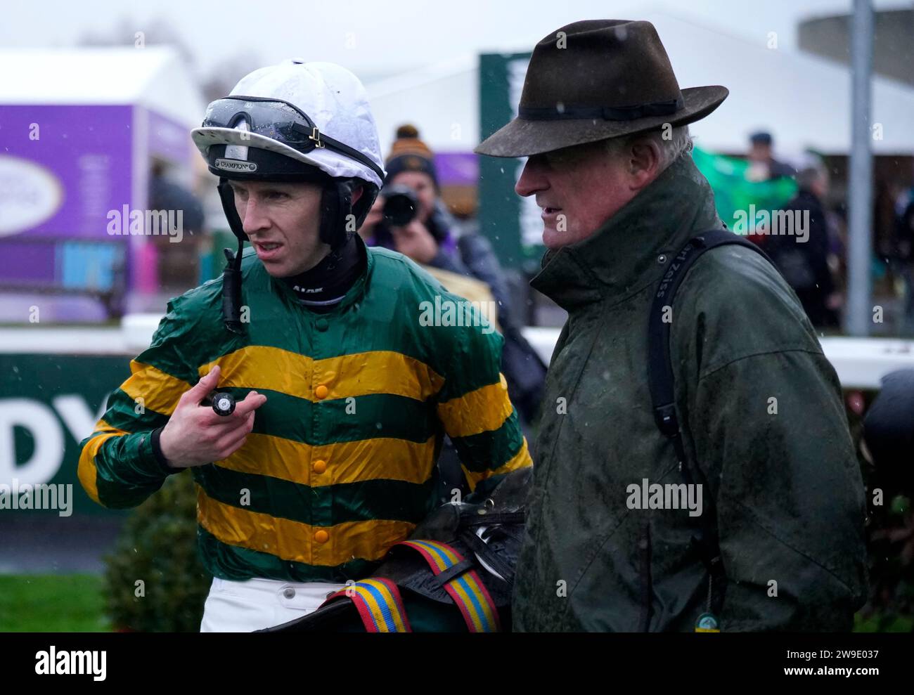 Jockey Mark Walsh (left) and trainer Willie Mullins after The Paddy's Rewards Club Chase during day two of the Leopardstown Christmas Festival at Leopardstown Racecourse, Dublin. Picture date: Wednesday December 27, 2023. Stock Photo