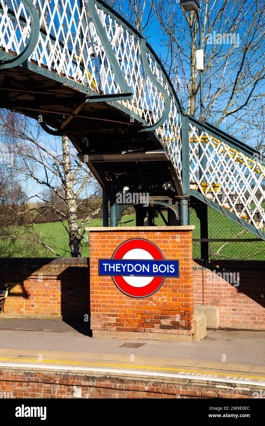 Pedestrian bridge and sign at Theydon Bois Station, Essex, England Stock Photo