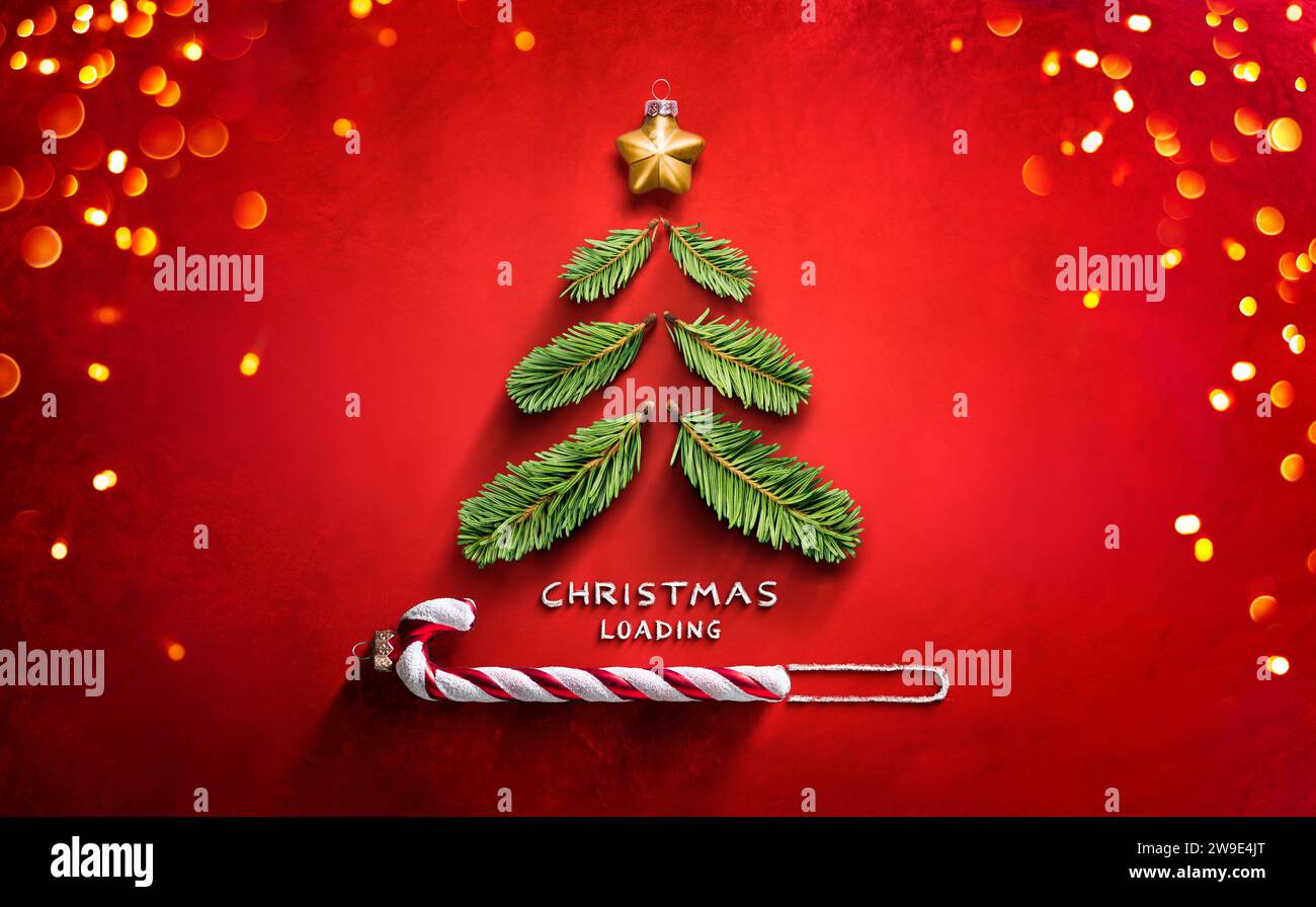 Christmas Loading Concept - Tree On Red With Progress Bar And Bokeh Lights Stock Photo