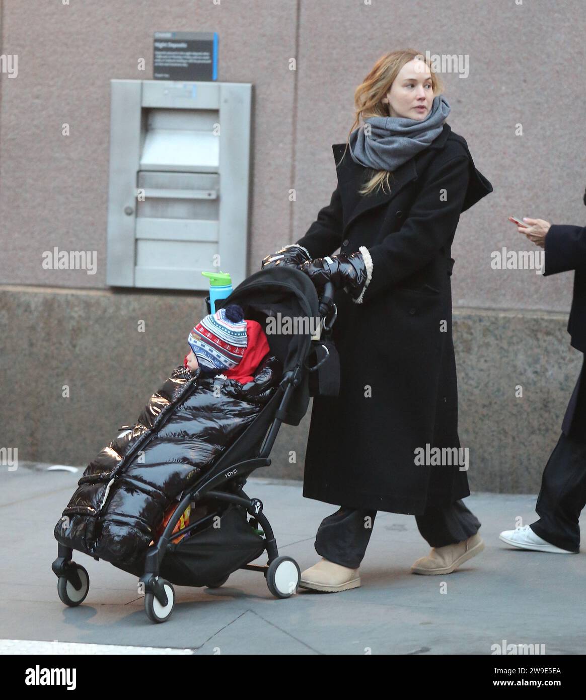 Jennifer Lawrence out for an early evening walk with her son Cy Maroney