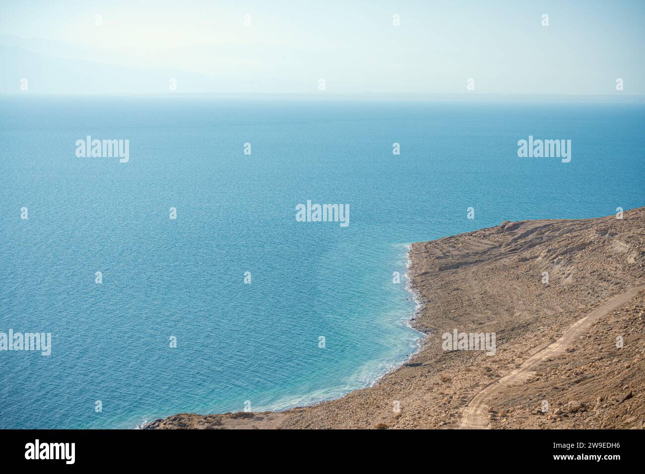 Arid coast on the Dead Sea Israeli side Stock Photo