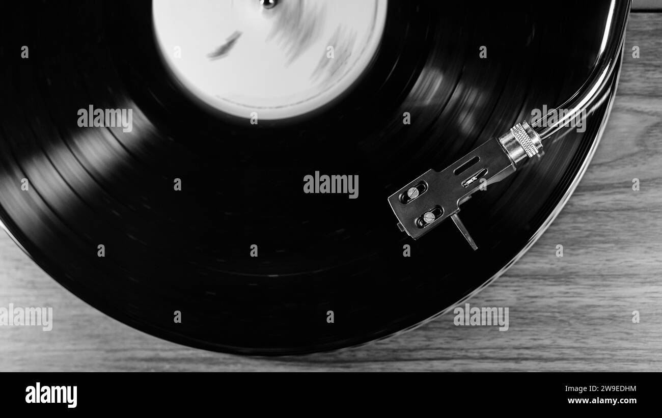 Black and white classic vinyl record,turntable spin, analog sound, music.Vintage Stock Photo