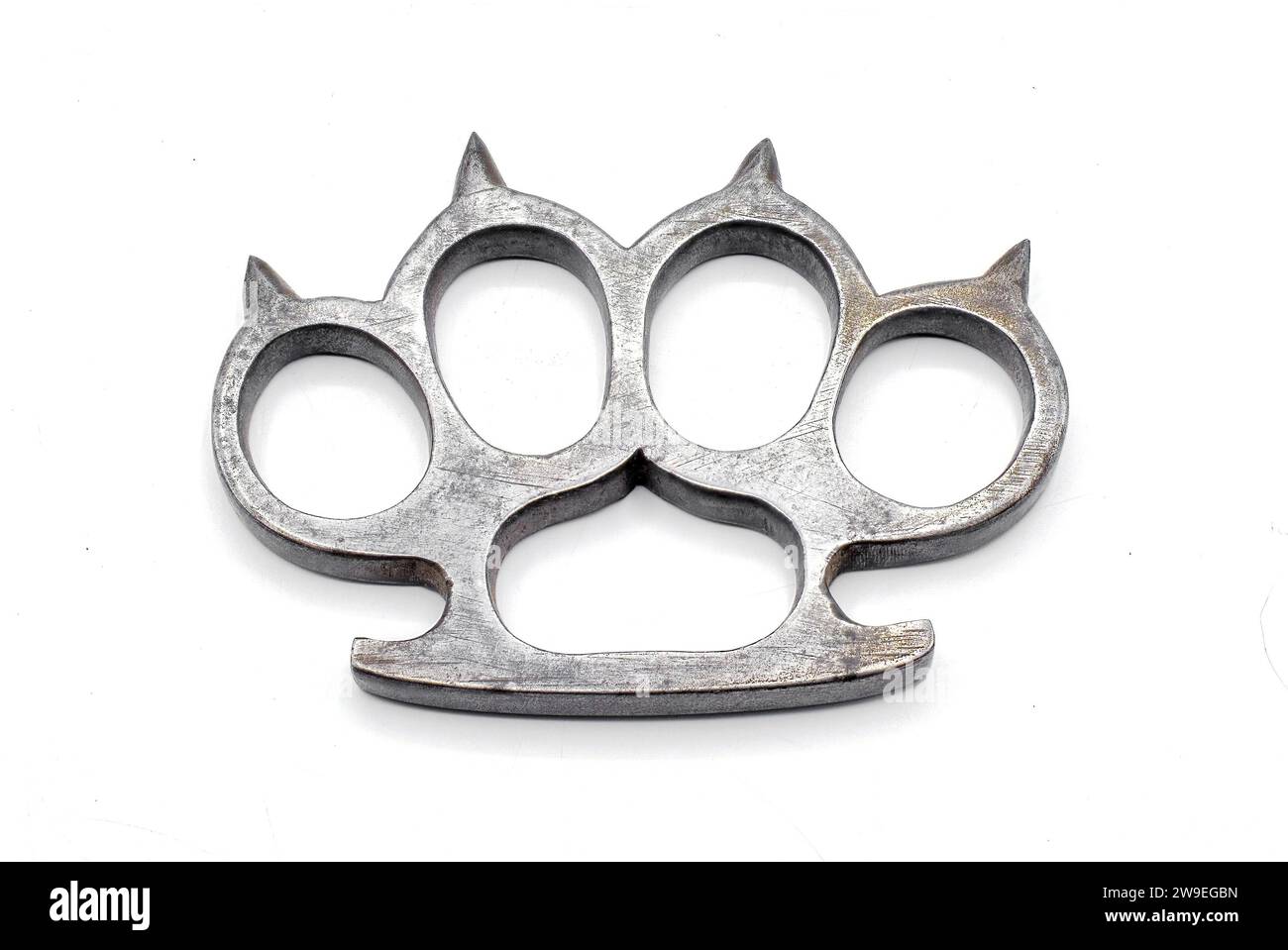 Thai Brass Knuckle-duster On White Stock Photo, Picture and