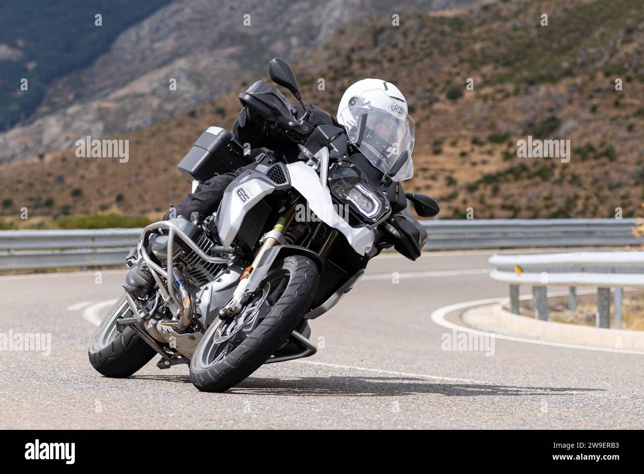 Motorcycle Sharp man on his motorcycle taking a sharp curve in the port of Navalmoral ...