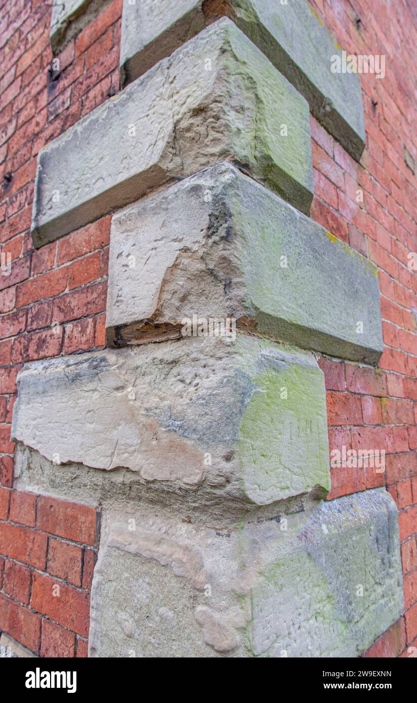 masonry quoins or cornerstones in stable block Stock Photo