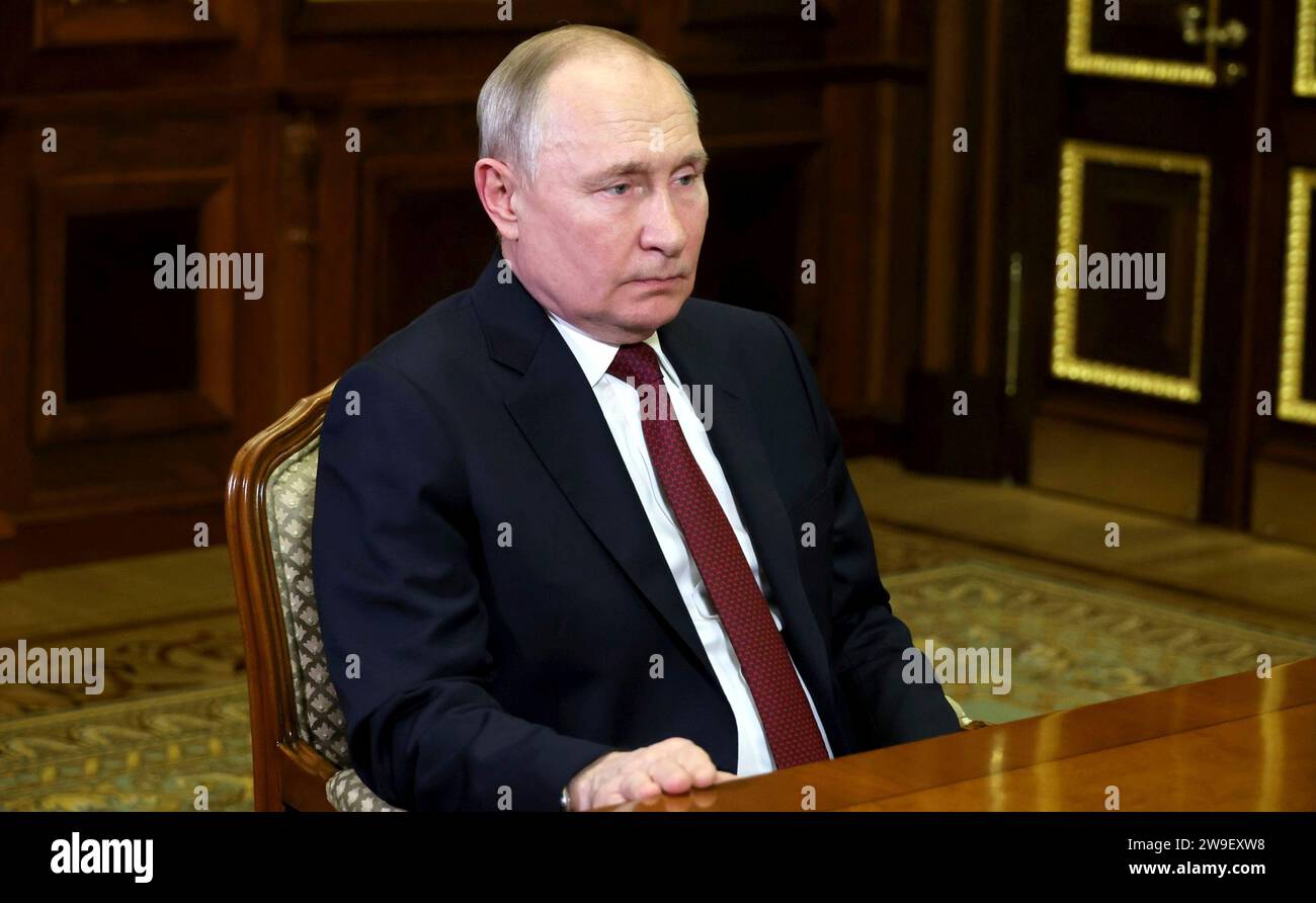 St Petersburg, Russia. 26th Dec, 2023. Russian President Vladimir Putin listens to Gazprom CEO Alexei Miller during a face-to-face meeting, December 26, 2023 in St Petersburg, Russia. Credit: Mikhail Klimentyev/Kremlin Pool/Alamy Live News Stock Photo