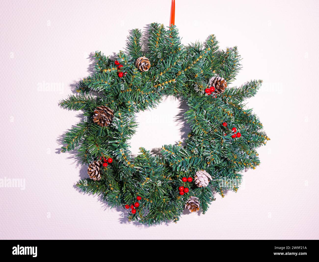 Decorated Christmas wreath found on many doors during the month of December. Stock Photo