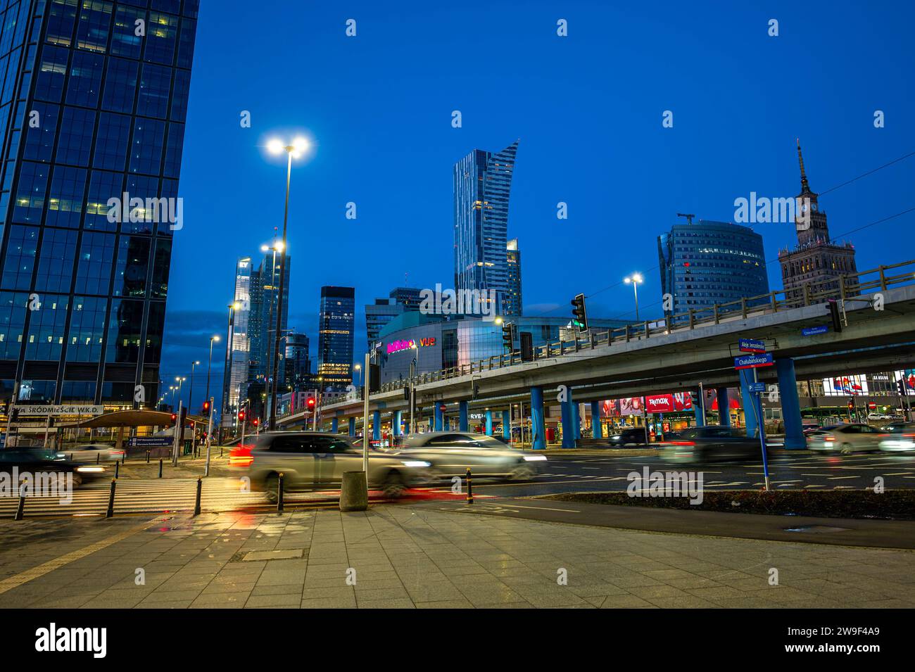 Warsaw, Poland - December 26, 2023: View of the city center with blurred shapes of vehicles. Stock Photo