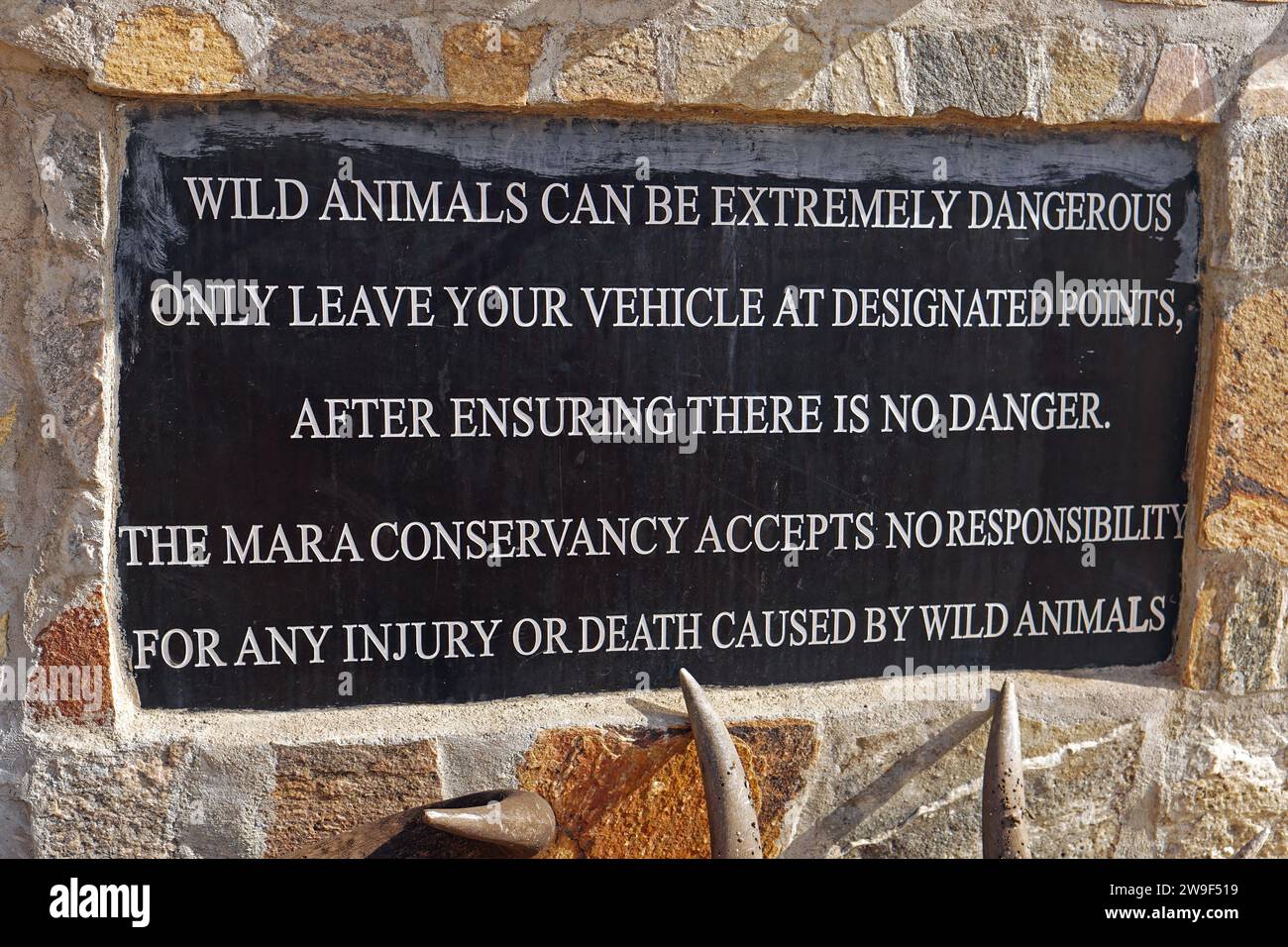 Narok, Kenya July 12, 2017 Warning sign wild animals danger in Mara