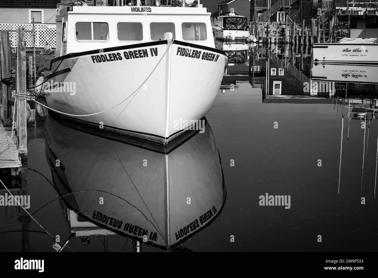 Fishermans cove fishing boat Black and White Stock Photos & Images - Alamy
