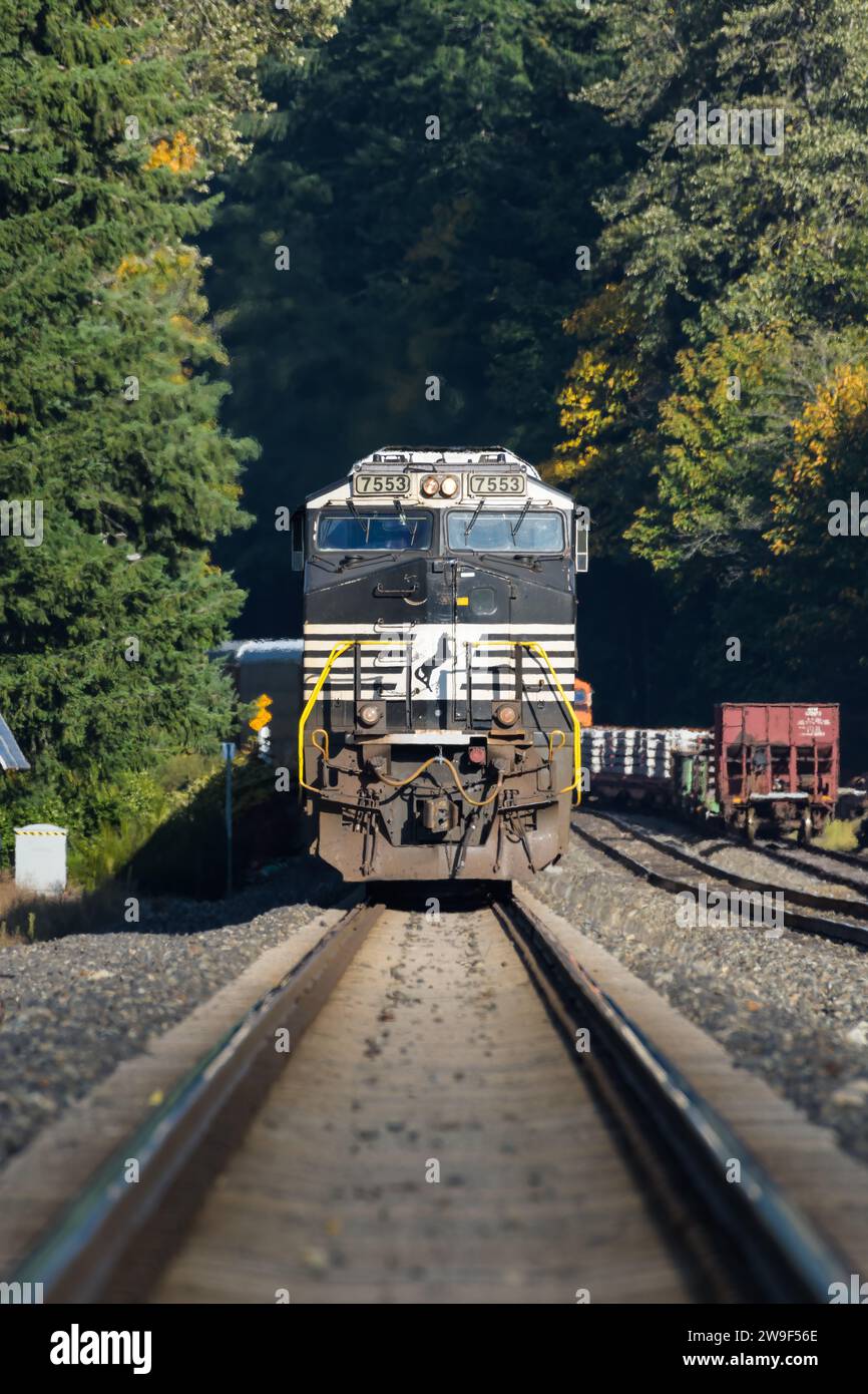 Skykomish, WA, USA - September 29, 2023; Norfolk Southern locomotive waits on track in  Washington State in early fall Stock Photo