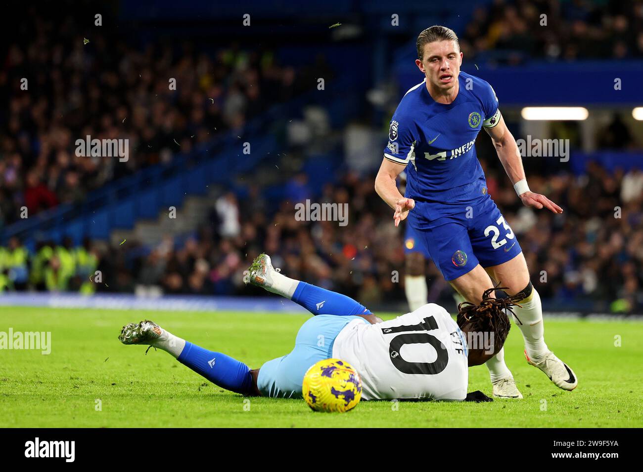 27th December 2023; Stamford Bridge, Chelsea, London, England: Premier League Football, Chelsea versus Crystal Palace; Conor Gallagher of Chelsea fouls Eberechi Eze of Crystal Palace Stock Photo