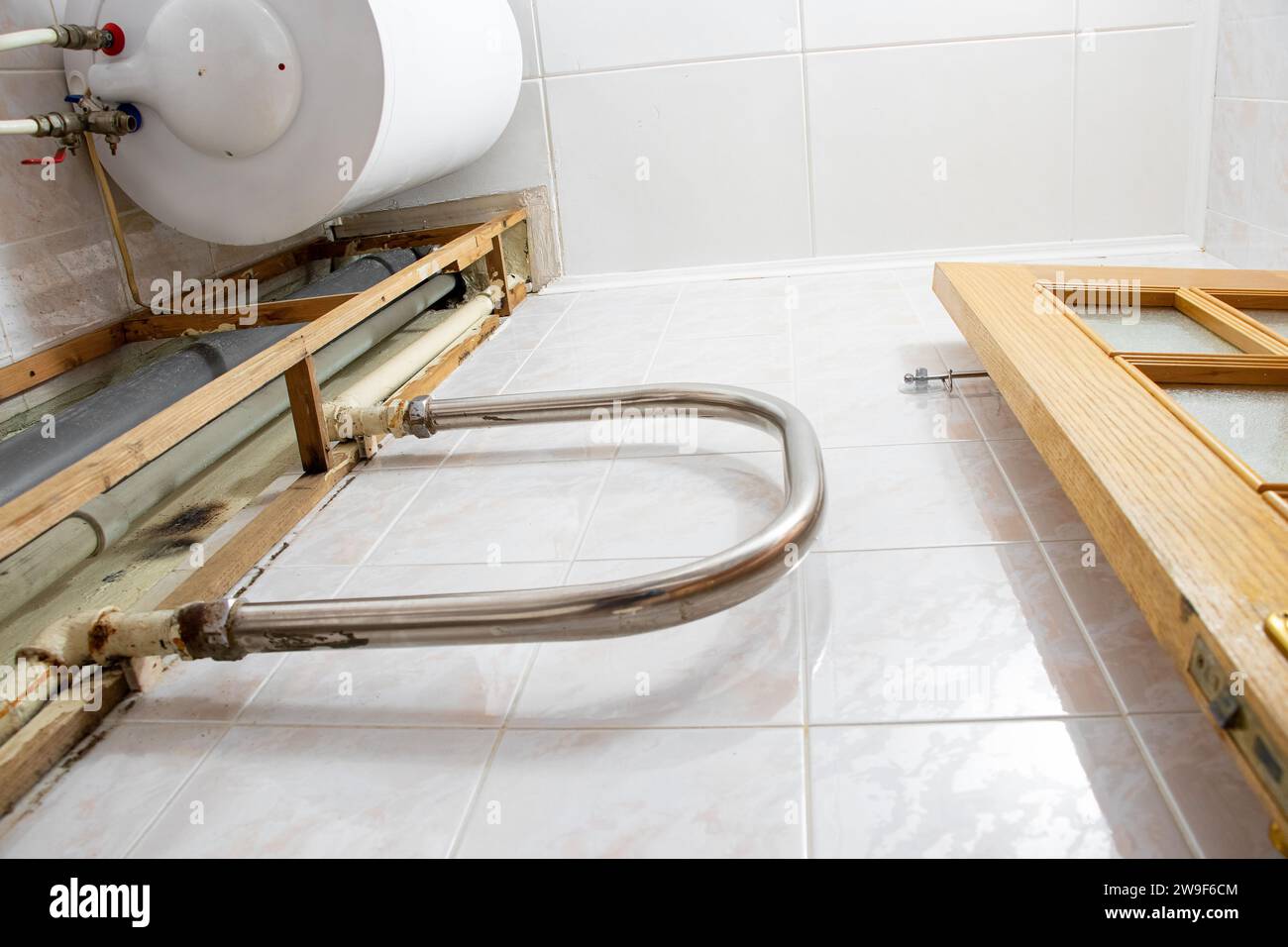 Water heater and pipes in a residential apartment after replacing the