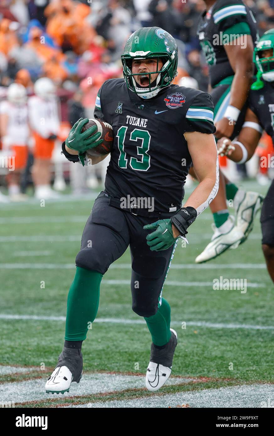 Annapolis, MD, USA. 27th Dec, 2023. Tulane Green Wave LB #13 Tyler Grubbs celebrates a touchdown during the Go Bowling Military Bowl between the Tulane Green Wave and the Virginia Tech Hokies at Navy-Marine Corp Memorial Stadium in Annapolis, MD. Justin Cooper/CSM (Credit Image: © Justin Cooper/Cal Sport Media). Credit: csm/Alamy Live News Stock Photo