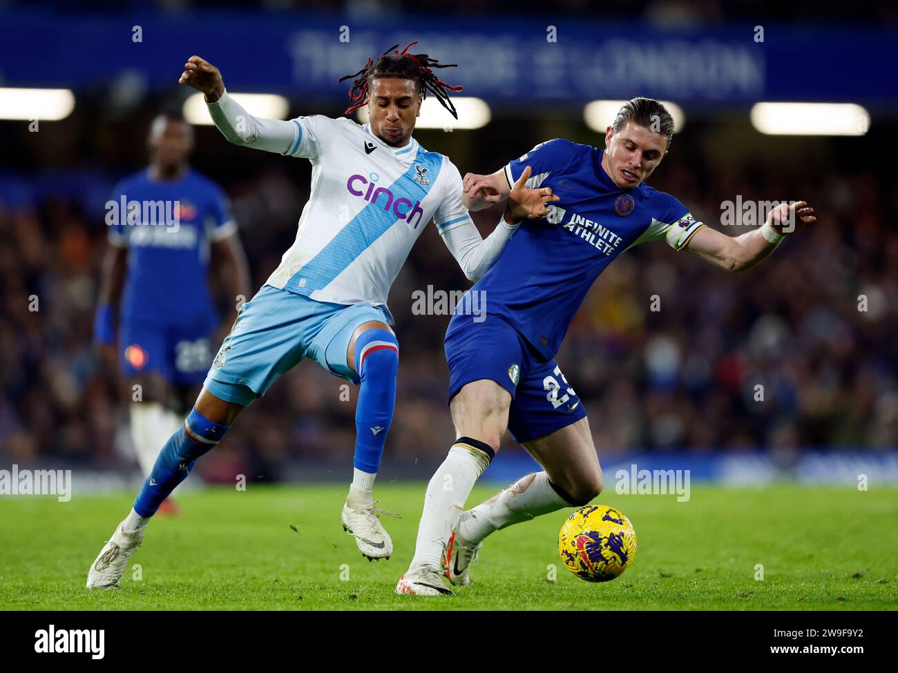 Crystal Palace's Michael Olise and Chelsea's Conor Gallagher (right) battle for the ball during the Premier League match at Stamford Bridge, London. Picture date: Wednesday December 27, 2023. Stock Photo