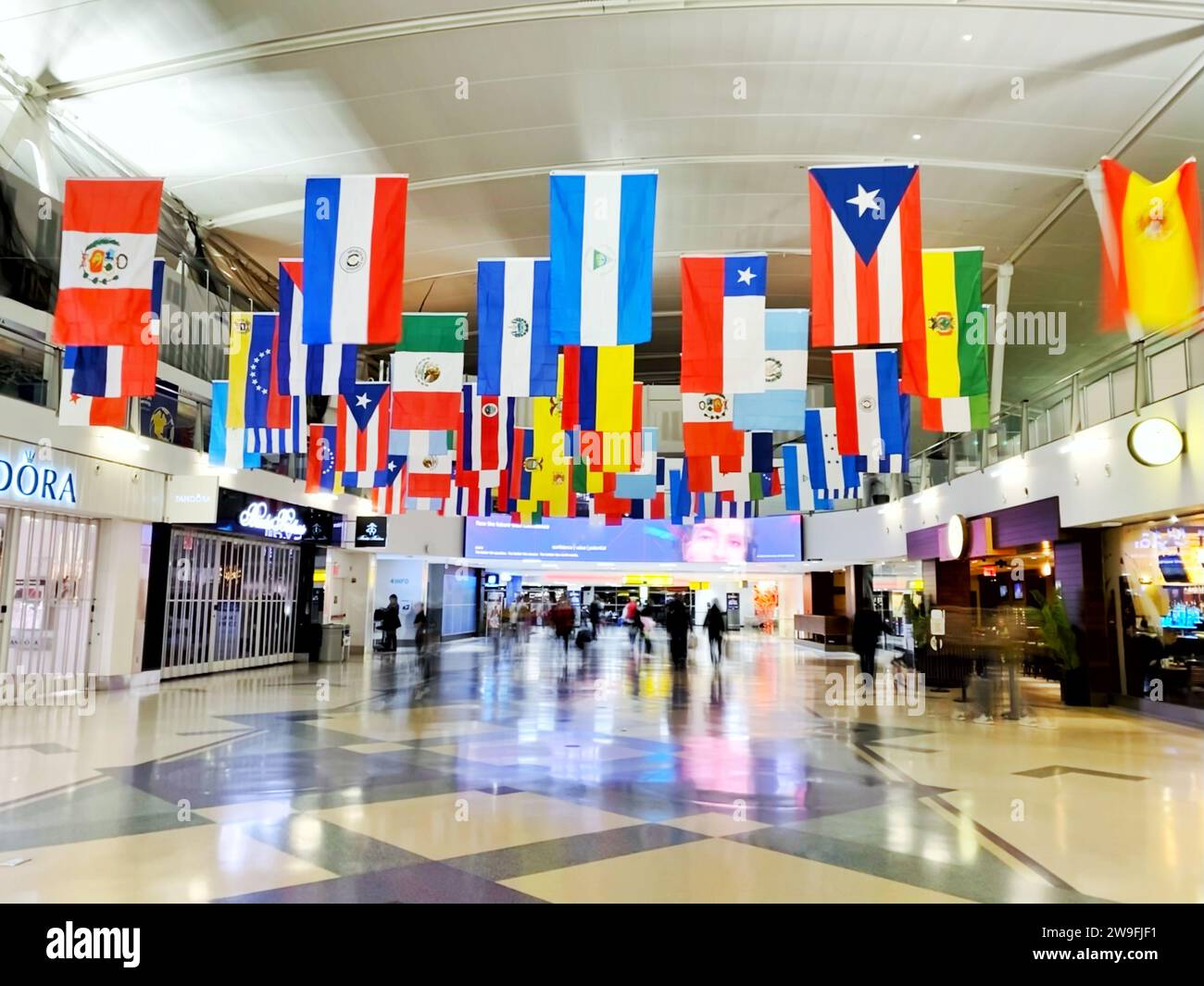World flags hanging in JFK John F. Kennedy International Airport in New York City, New York, United States Stock Photo