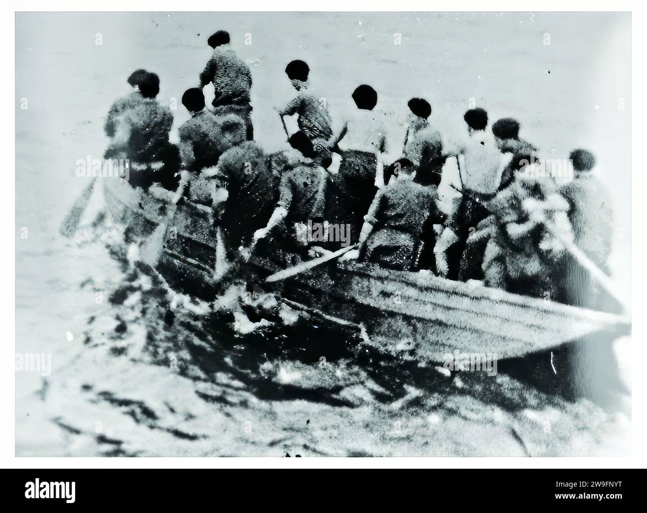 Operation RIMAU. Members of the party paddling from the submarine HMS