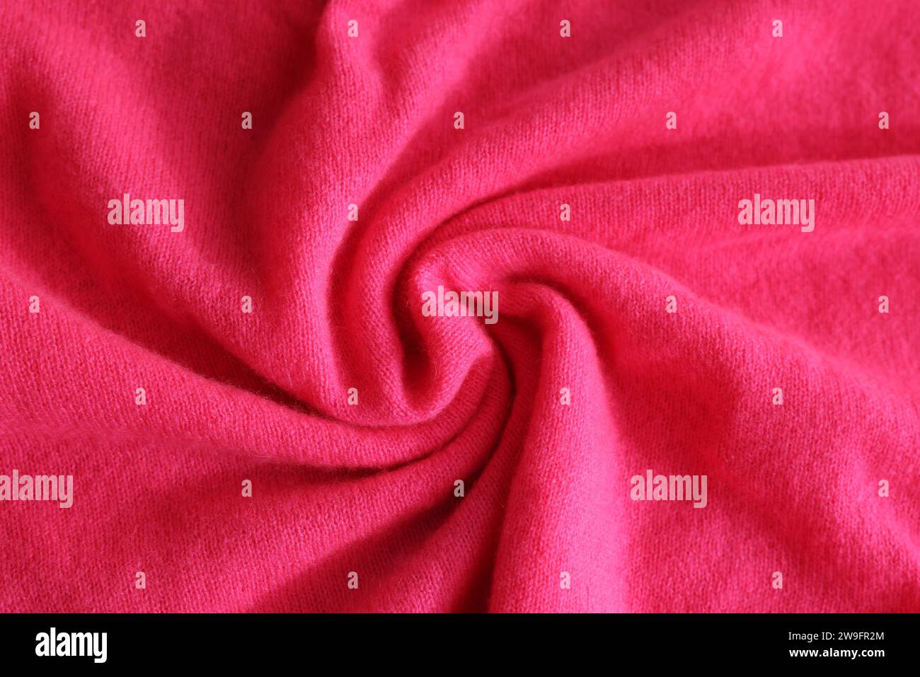 Beautiful pink fabric as background, top view Stock Photo - Alamy