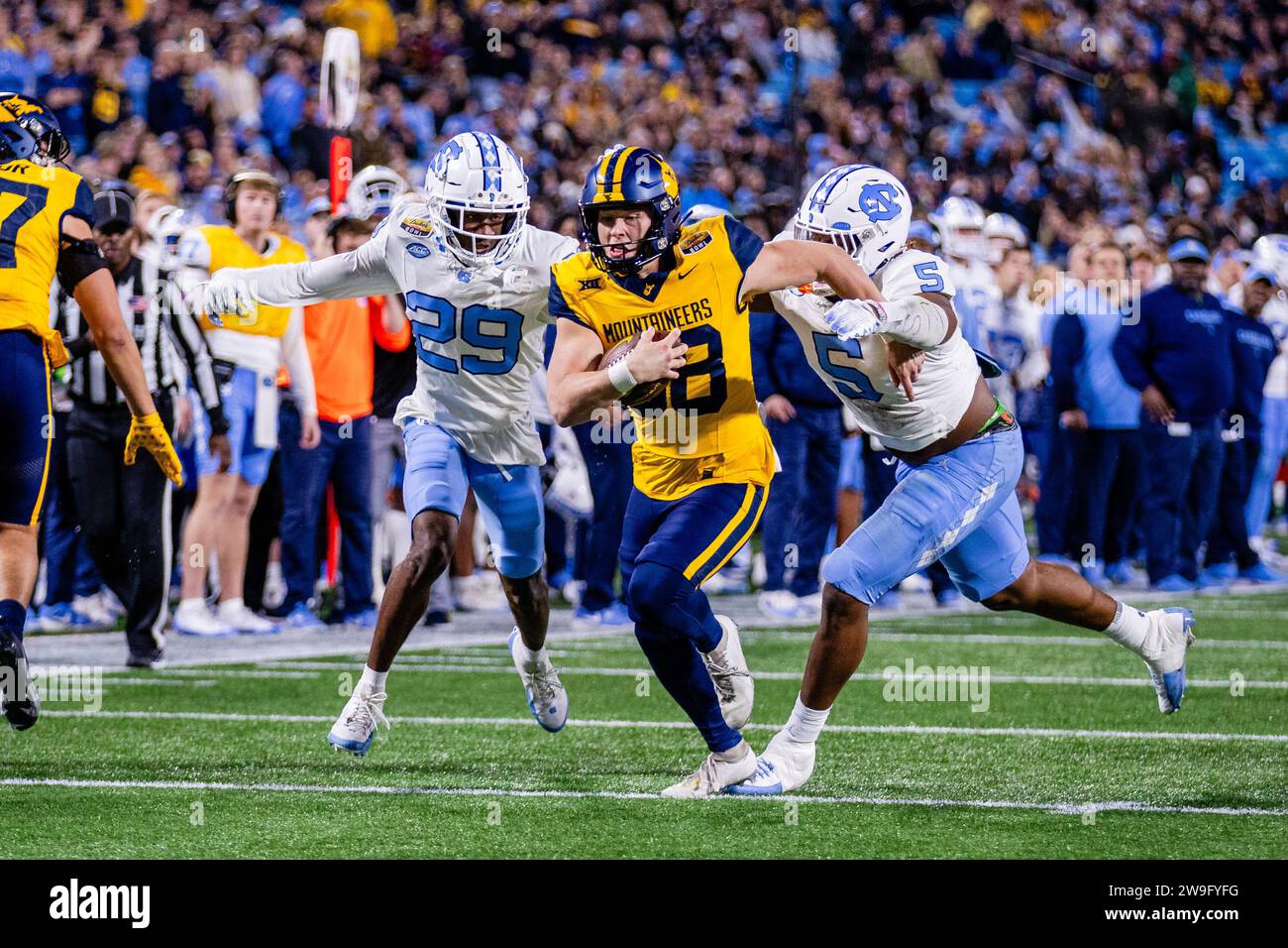 Charlotte, NC, USA. 27th Dec, 2023. West Virginia Mountaineers punter