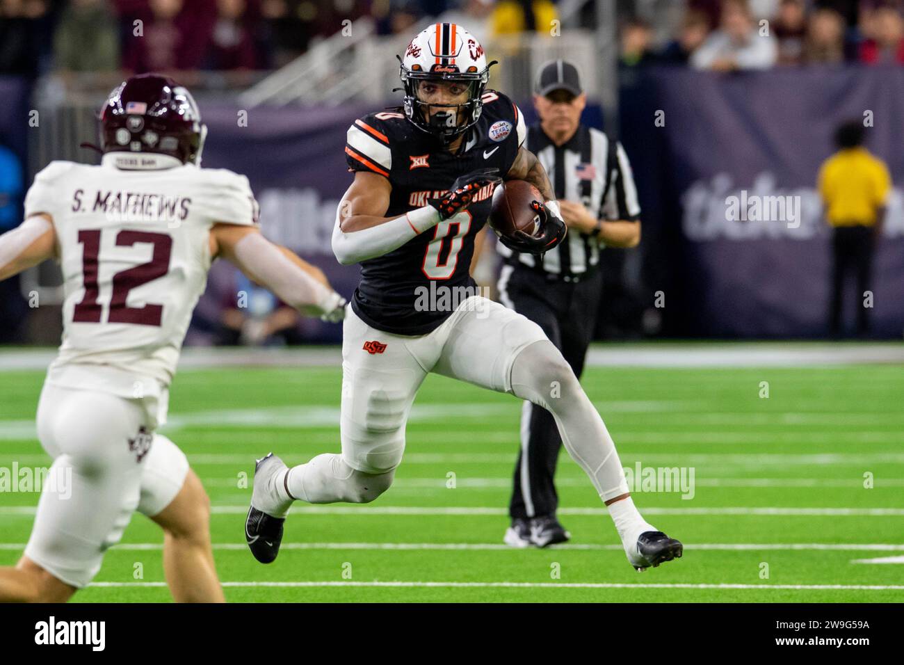 houston-tx-usa-27th-dec-2023-oklahoma-state-cowboys-running-back