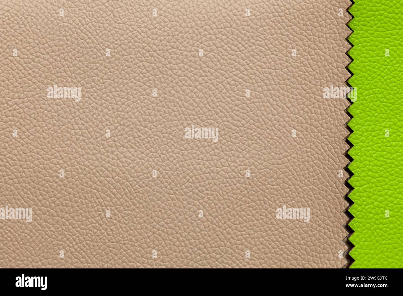 Background image of two pieces of multi-colored leather. Stock Photo