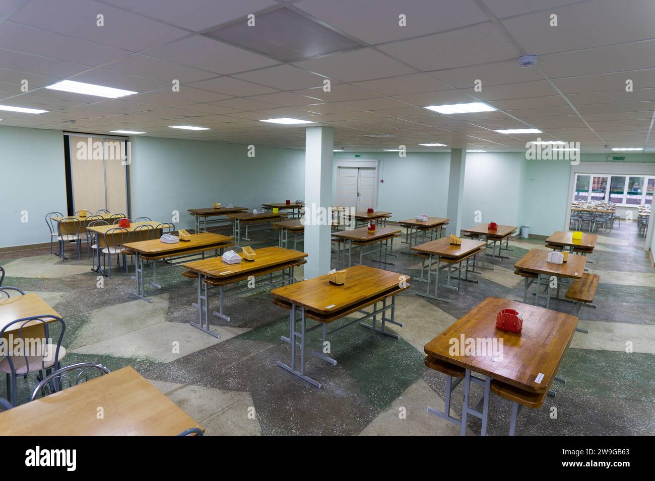 Cafeteria, dining room in university, cafe with tables and chairs