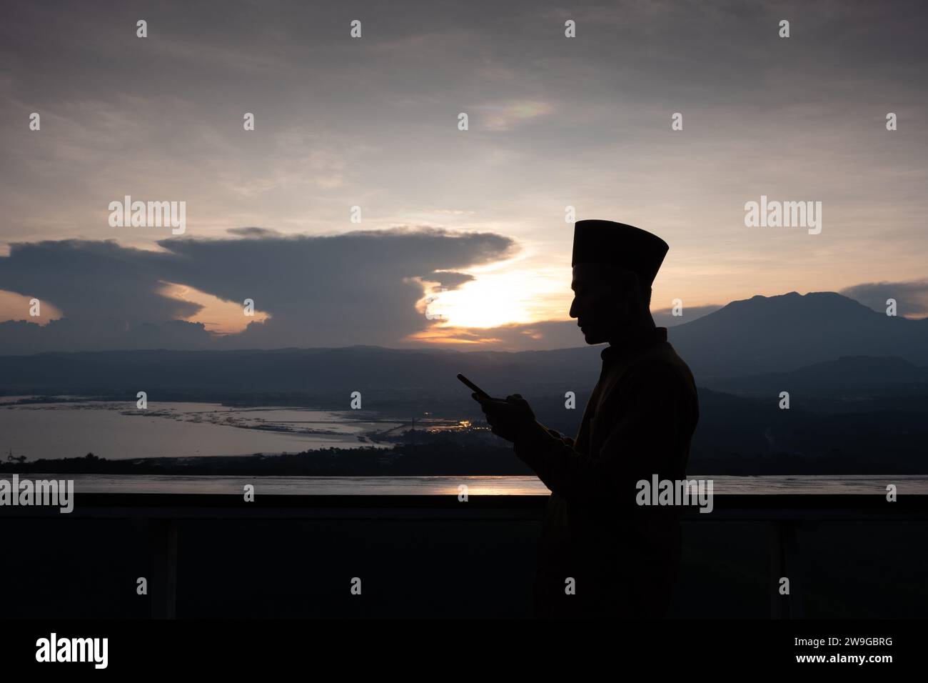 Silhouette young asian muslim man hi-res stock photography and images ...