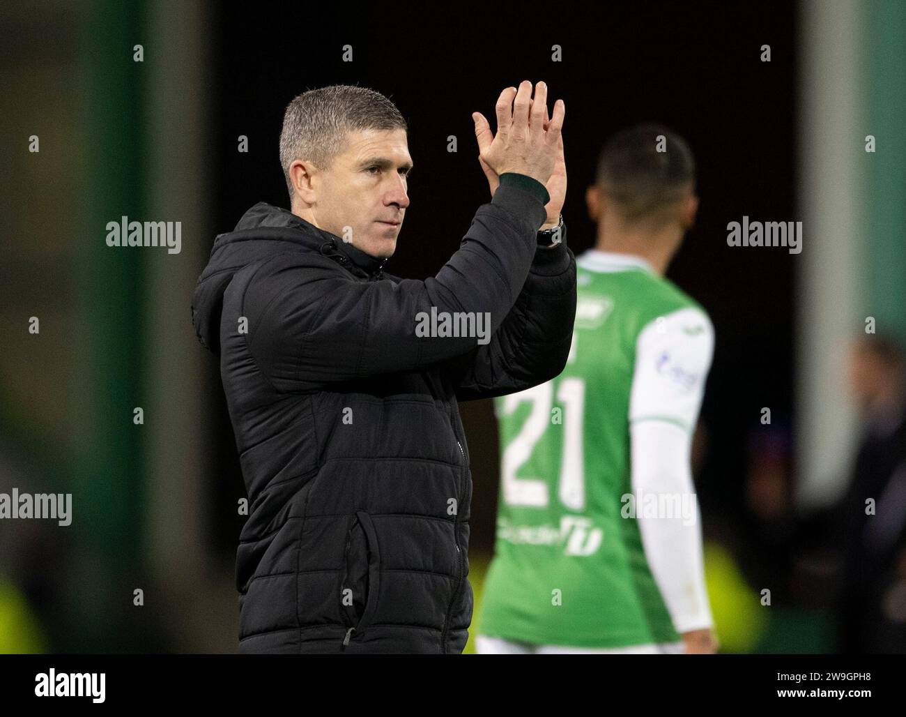 Edinburgh, UK. 27th Dec, 2023. Scottish Premiership - Hibernian FC v Heart of Midlothian FC 27/12/2023 Hibs' Head Coach, Nick Montgomery, salutes the crowd at the end of the match which finished 1-0 to the visitors as Hibernian took on Heart of Midlothian in the Scottish Premiership at Easter Road Stadium, Edinburgh, UK Credit: Ian Jacobs/Alamy Live News Stock Photo