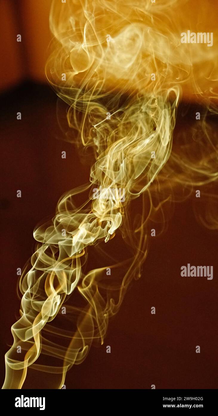 Forms of smoke in suspension rising through the air Stock Photo Alamy