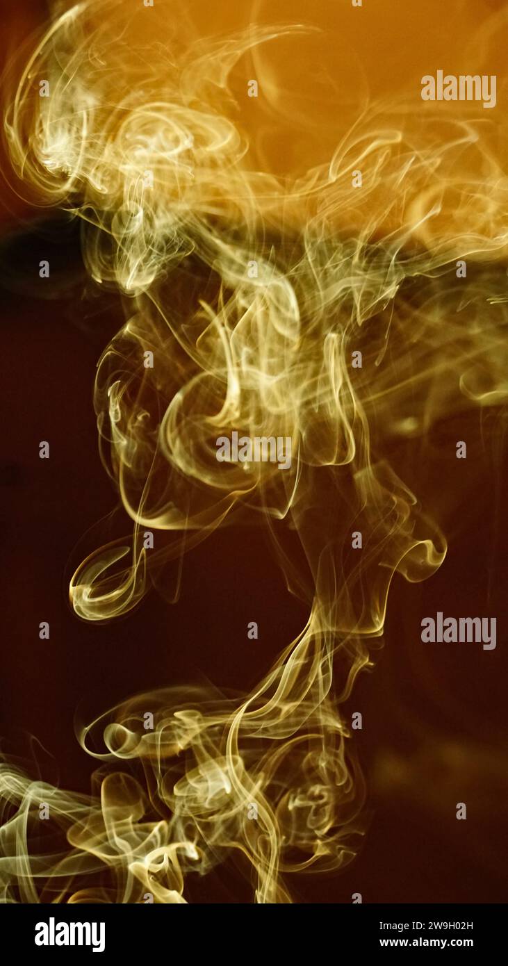 Forms of smoke in suspension rising through the air Stock Photo Alamy