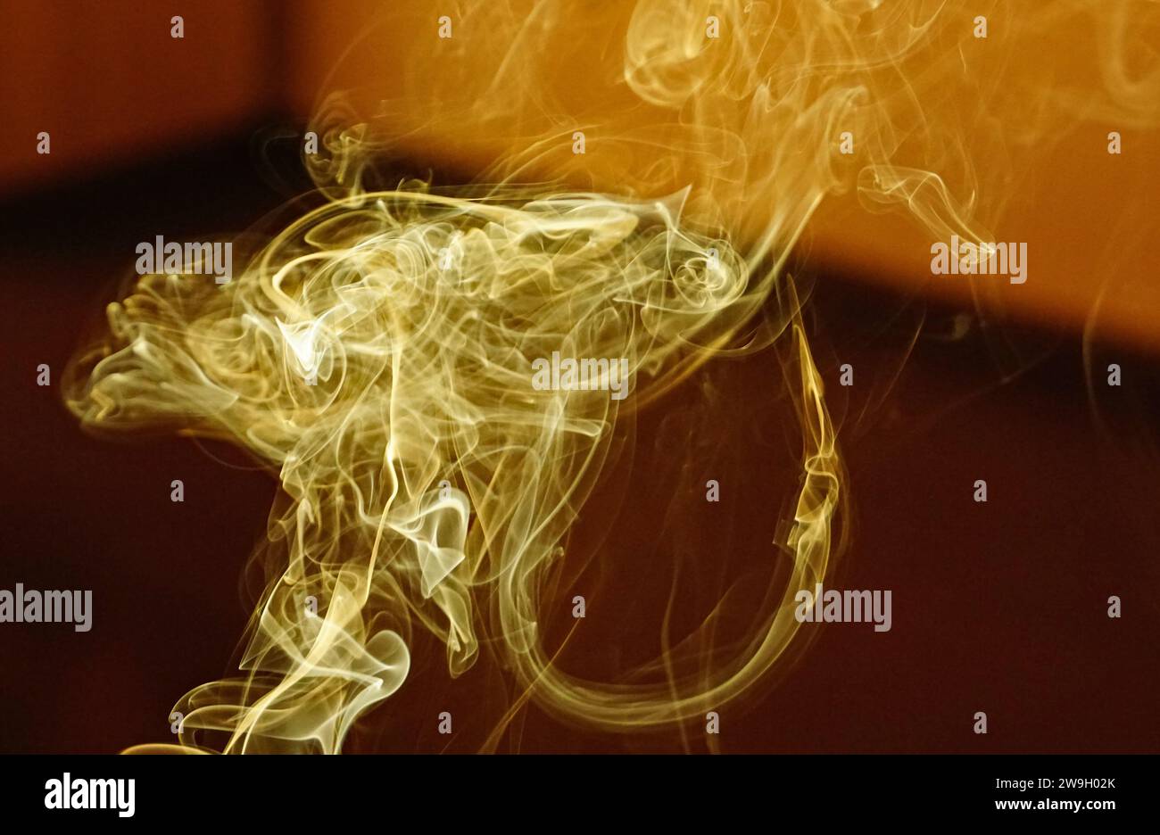 Forms of smoke in suspension rising through the air Stock Photo Alamy